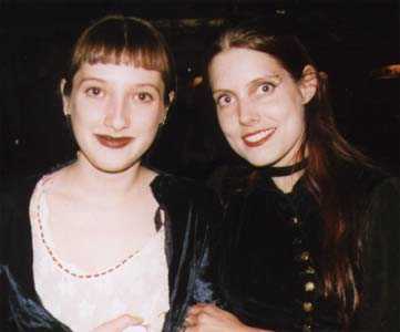 Winter on the right and her friend visit the Asylum Ball.