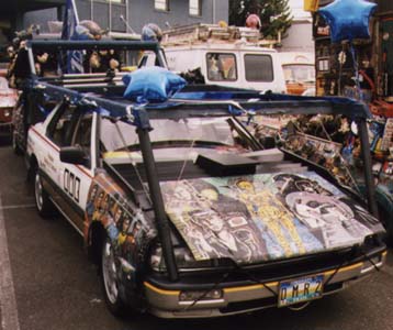 Click here to see the set of 97 Art Cars. David Rich's Acura Legend is a multi-purpose vehicle, part work truck, part cosmic receptor unit and part pertformance platform.