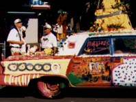 An old car with a mountain on it