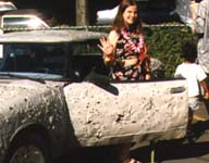 A Toyota Celica with intentional holes in the body done with a shot gun